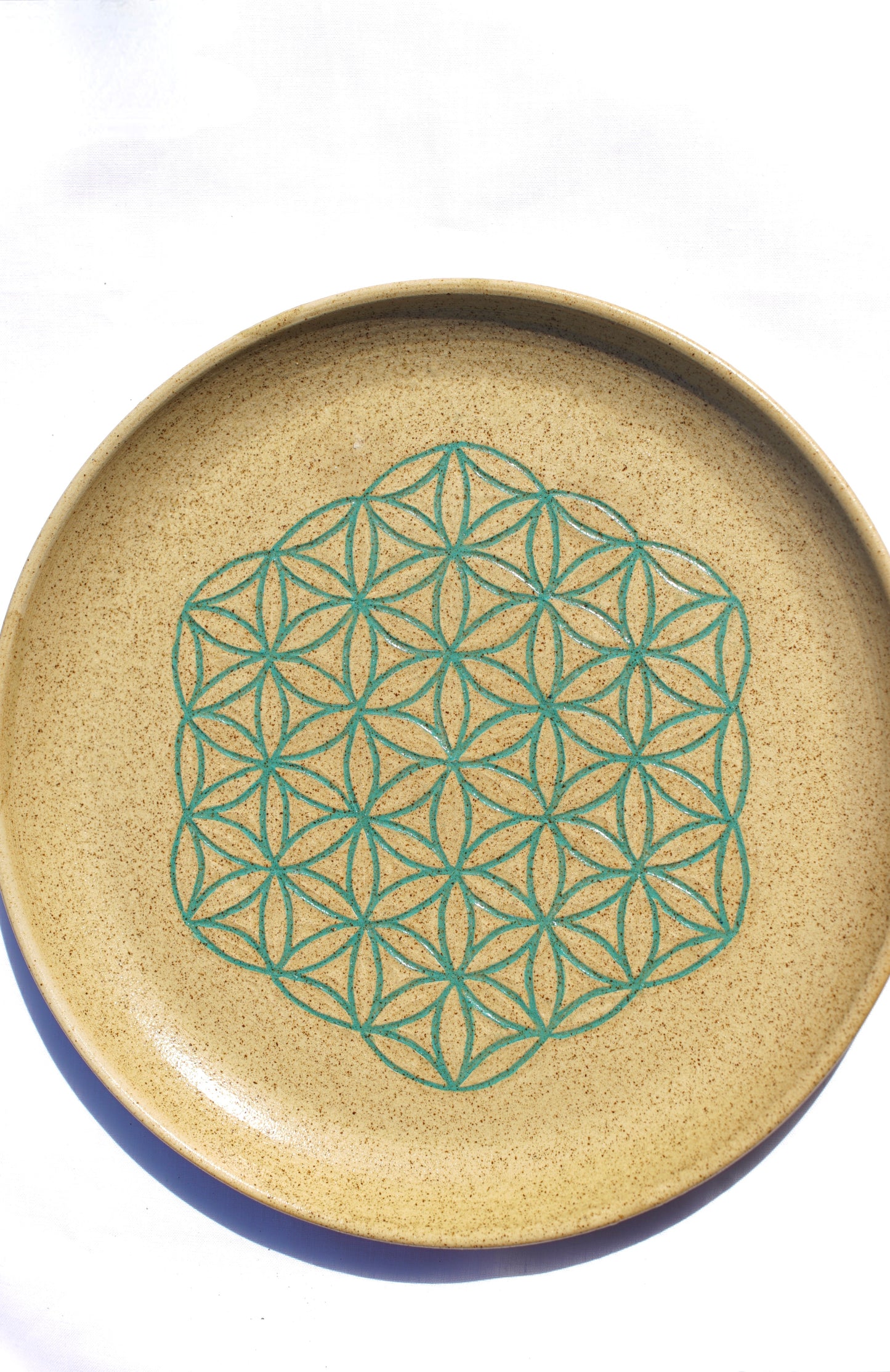 Plate with flower of life in jade