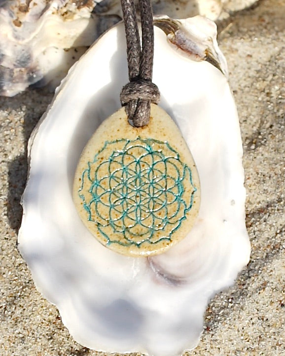 Amulet with flower of life in jade