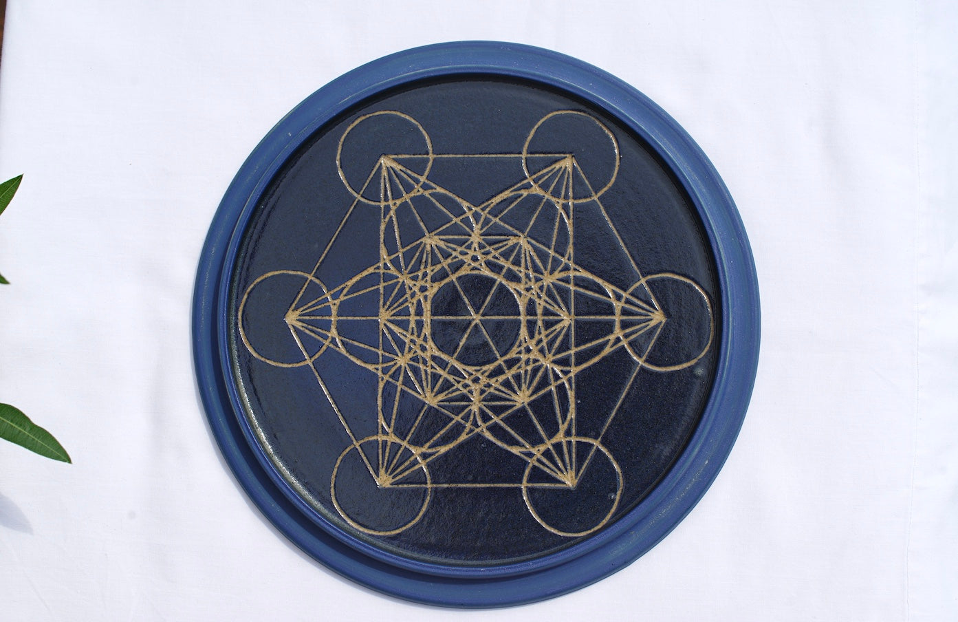 Blue tealight dome with flower of life at the top