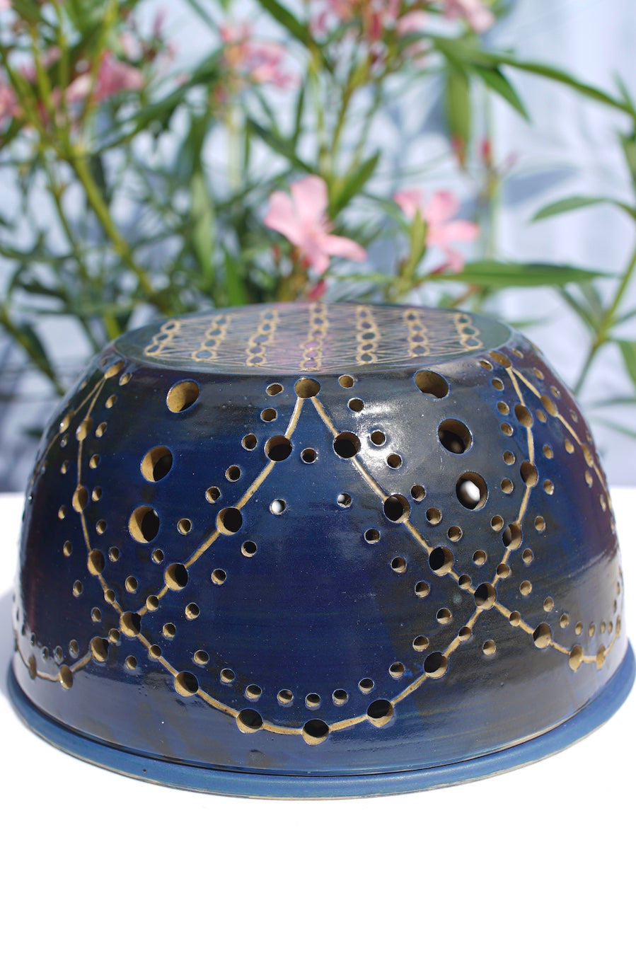 Blue tealight dome with flower of life at the top