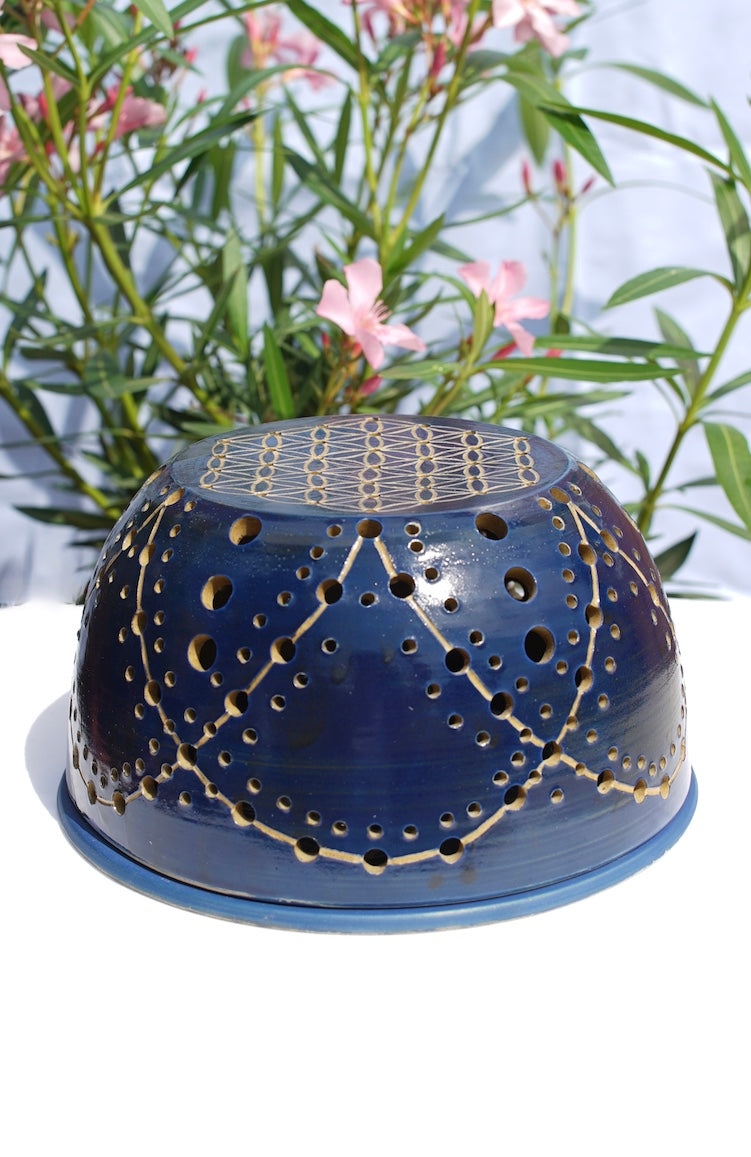 Blue tealight dome with flower of life at the top