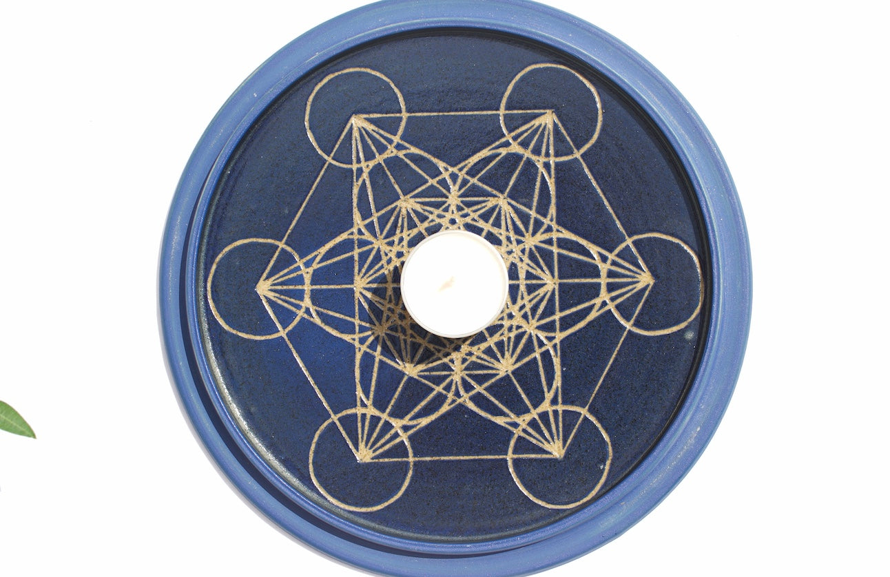 Blue tealight dome with flower of life at the top