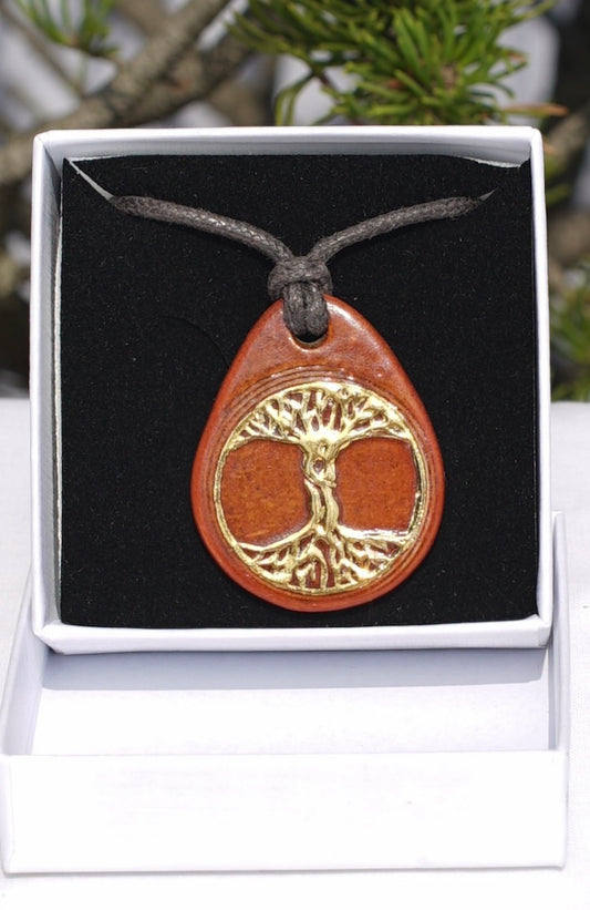 Amulette cannelle arbre de vie or 24 carats