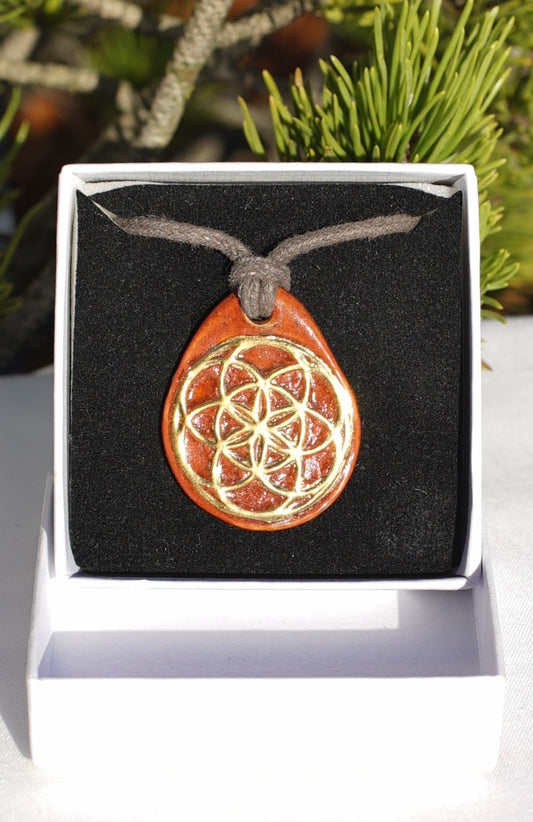 Amulet cinnamon seed of life and flower of life in 24 carat gold