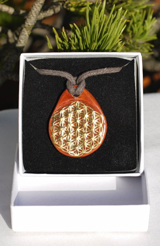 Amulet cinnamon seed of life and flower of life in 24 carat gold