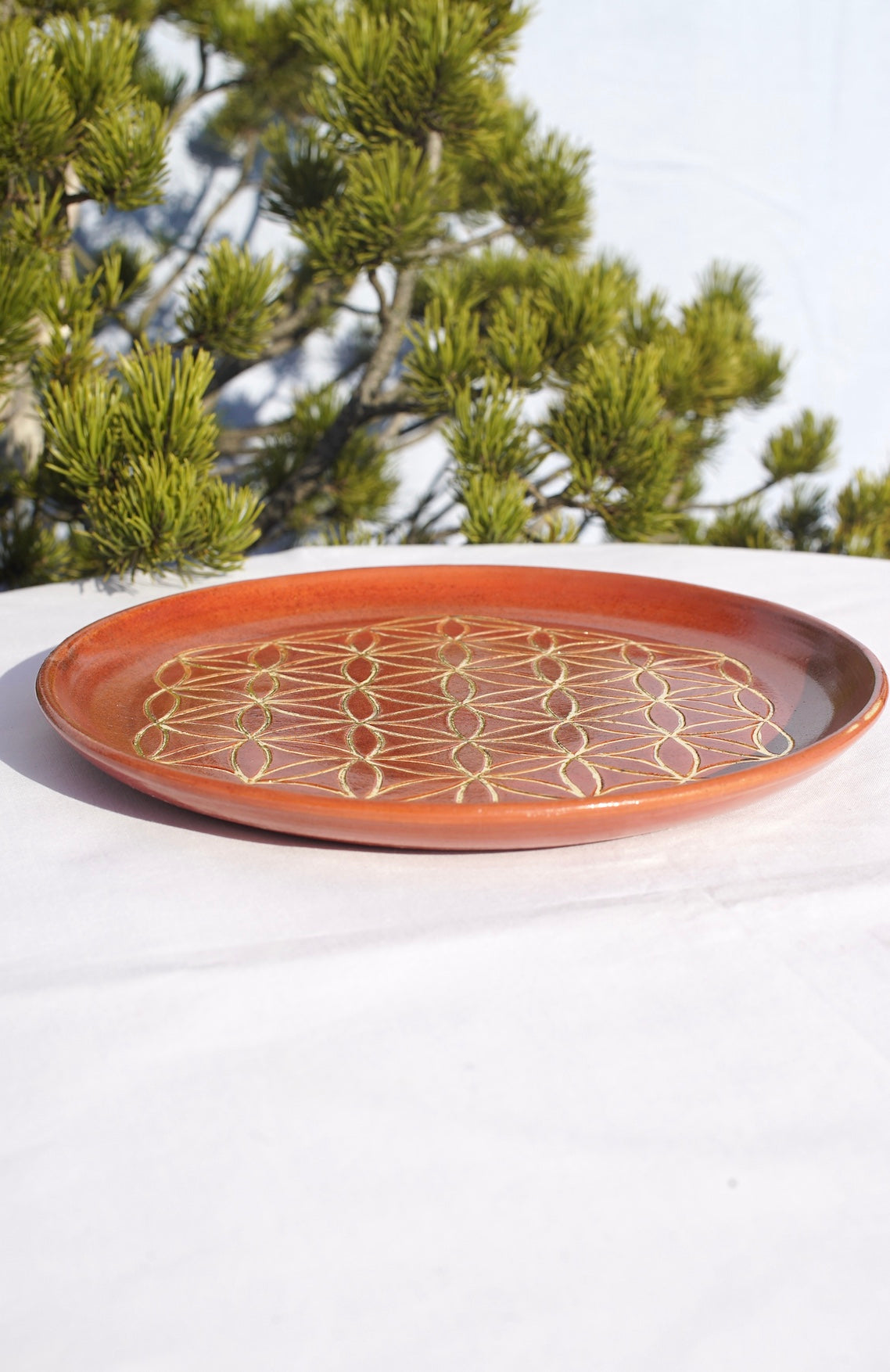 Cinnamon plate with flower of life 24 carat gold