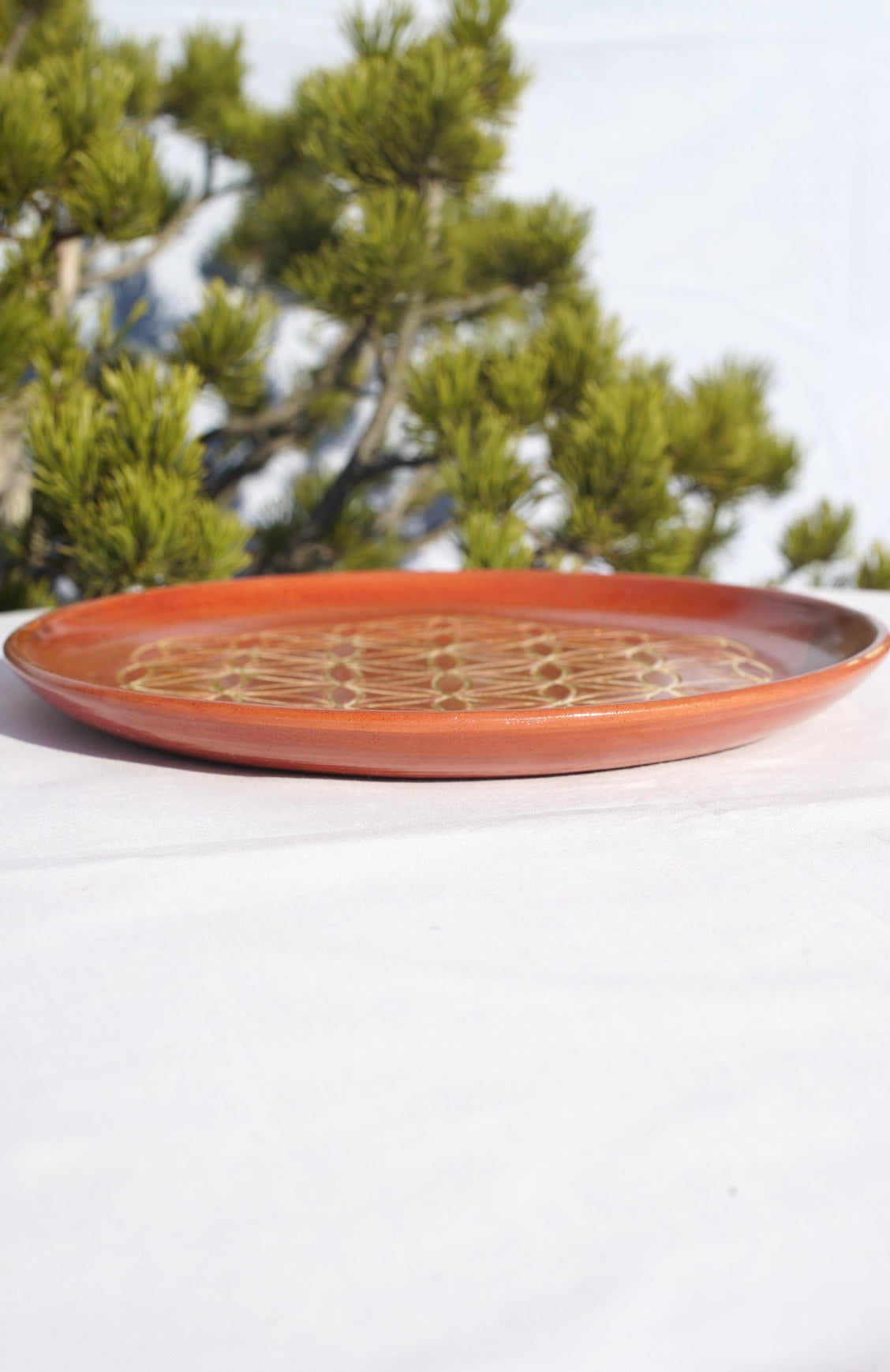 Cinnamon plate with flower of life 24 carat gold