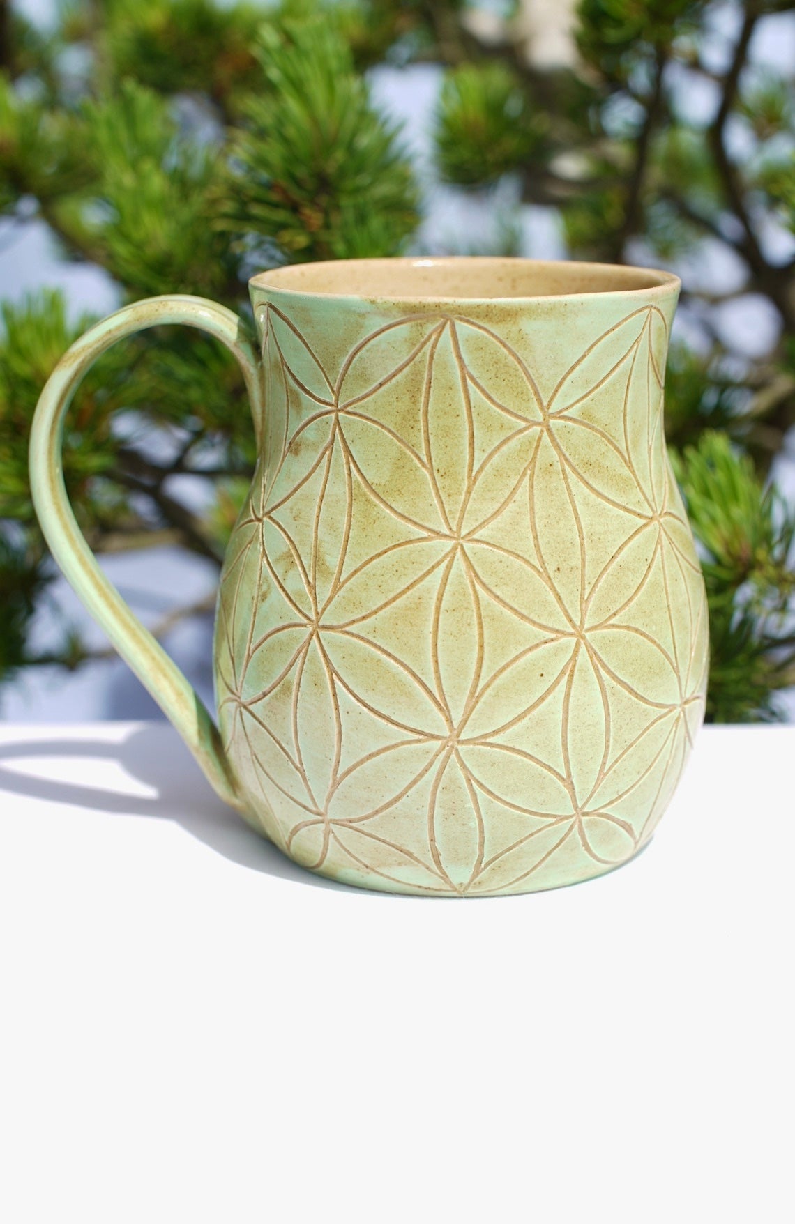 Flower of life mug light green sgraffito