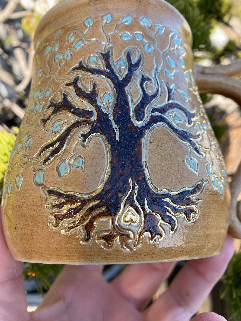 Antique tree of life cup with healing earth and gold