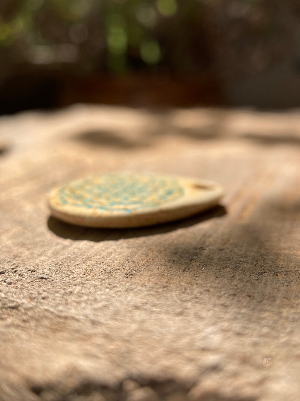 Amulet with flower of life in jade